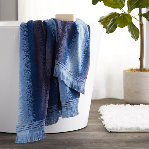 Eckhart Stripe Towels, Blue, displayed on side of bathtub