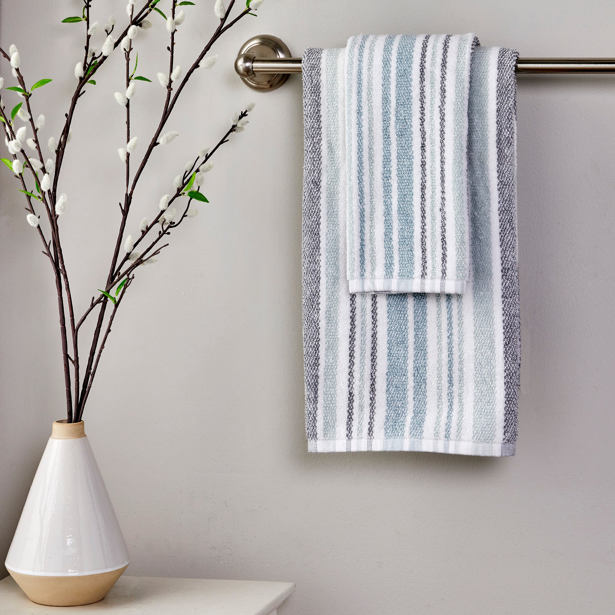 Farmhouse Stripe Towels, Aqua Multi, displayed on towel bar with vase
