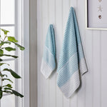 Planet Ombre Towels, Aqua, hanging on hooks