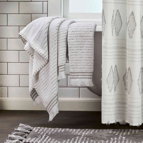 Subtle Stripe Towels, White/Gray, Lifestyle, displayed hanging over bathtub